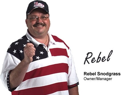 A smiling man wearing glasses, a cap, and a polo shirt with an American flag design stands with his right hand raised. Text next to him reads: "Rebel, Rebel Snodgrass, Owner/Manager.